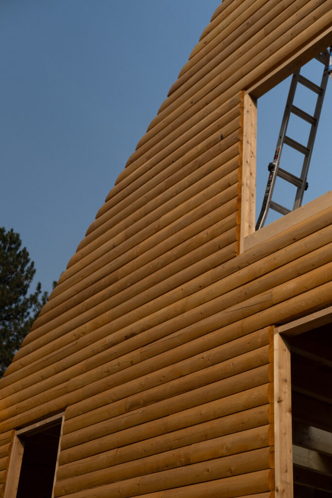 Custom cedar log cabin exterior in Idaho mountains