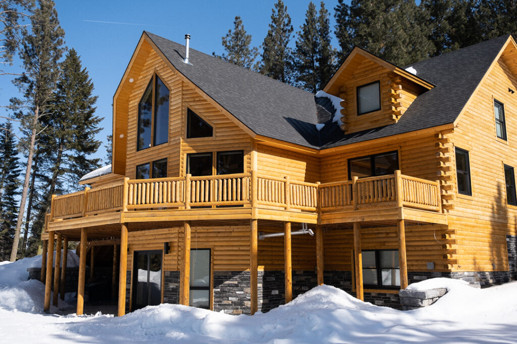 Custom cedar log cabin exterior in Idaho mountains