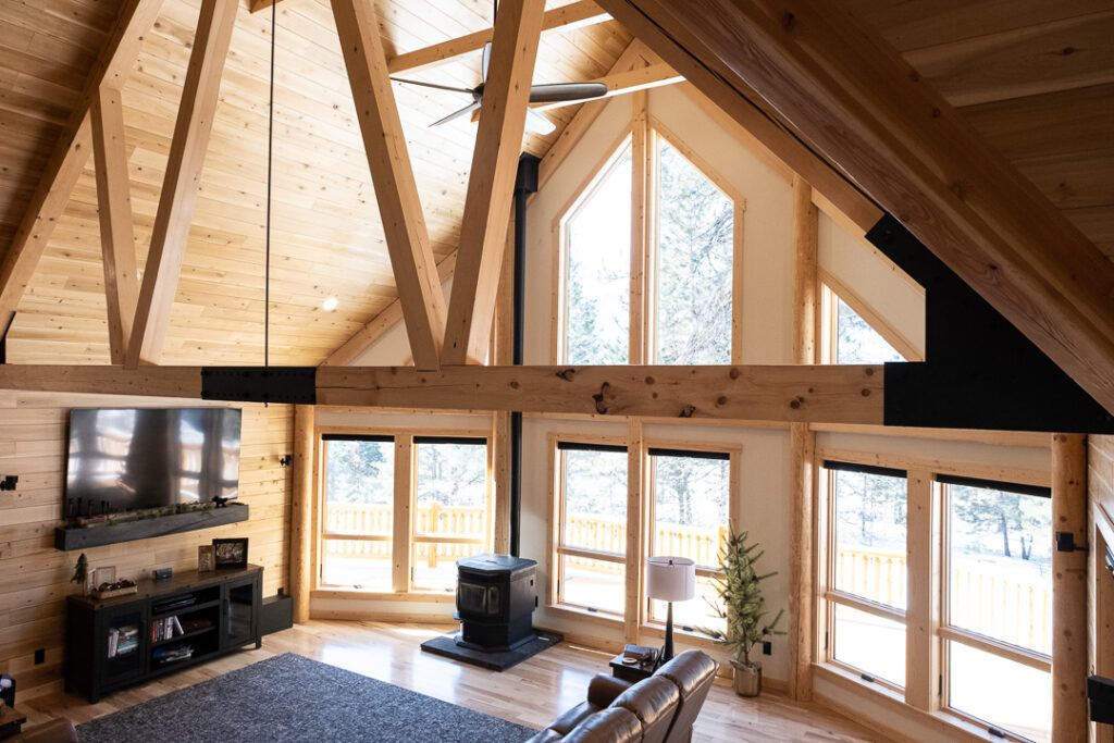 Open-concept great room inside custom log cabin home
