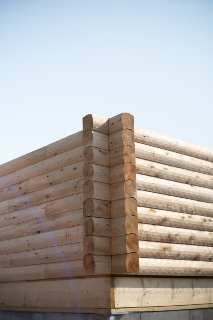 Interior of custom Northern White Cedar log home with timber framing